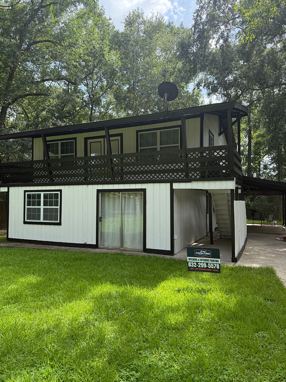 black and white exterior residential painting project completed in Conroe, TX by 74 Painting