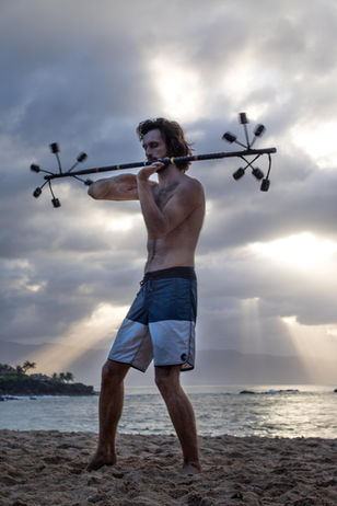 Fire dancing at sunset in Oahu