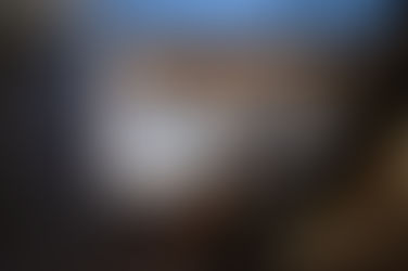 「野毛・格子の家」階段と吹抜けの夕景