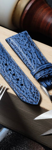 Watch strap (domed 4.0 to 2.0 mm thick) entirely handmade and hand-sewn in blue shark leather, Zermatt calfskin lining, navy linen thread (S stitching) and tone-on-tone edge painting.