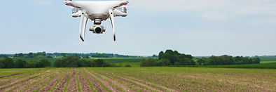 drone-quad-copter-with-high-resolution-digital-camera-on-green-corn-field-agro.jpg