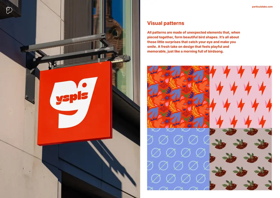 a red yspls sign hangs on a building