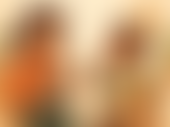 a young boy giving a thumbs up while holding a teddy bear, seated across from a behaviour therapist with a clipboard. The calm room features potted plants and warm tones, symbolising the supportive and positive nature of behaviour therapy.