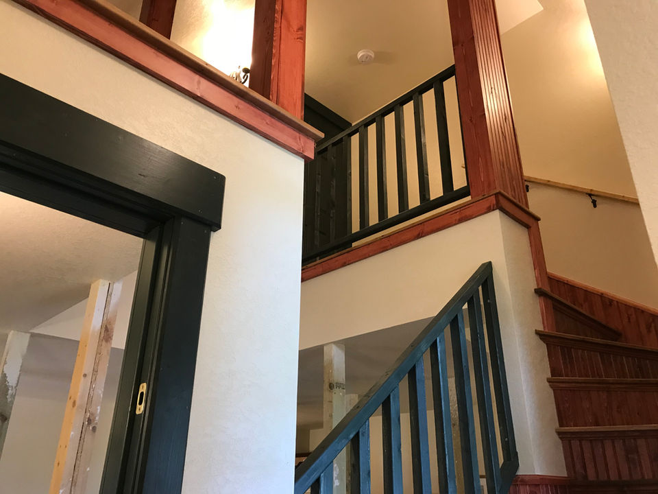 Croftville Road Cottages. Ascend this interior stairway up to Inn Suite #8 to get a bird's eye view of Lake Superior. This suite occupies the entire top floor of The Inn.