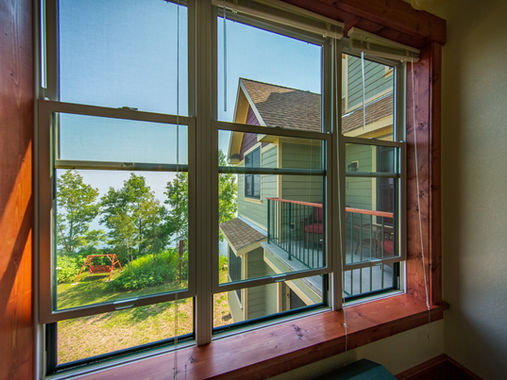 Croftville Road Cottages. This can be your spectacular view of Lake Superior as you look out these windows from your bed in Inn Suite #4.