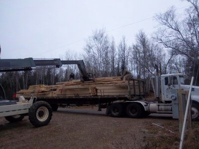 Croftville Road Cottages. When positioned these trusses are designed to hold an amazingly large load. However, they are quite fragile when moving them around in the horizontal position. Great care must be taken in unloading the larger trusses.