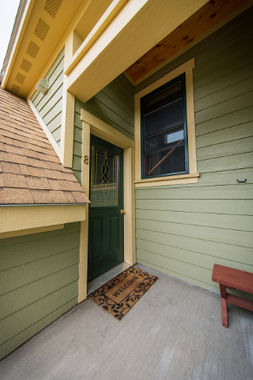 Croftville Road Cottages. Once you have climbed up the flight of exterior steps to this entry porch, you will still have another flight of interior steps to go. Inn Suite #8 is worth the climb up.