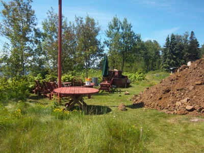 Croftville Road Cottages.
We though we had plenty of space to dig a large hole but as the dirt pile continues to grow it encroaches on our fire circle.