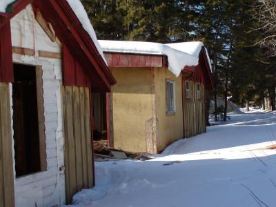 Croftville Road Cottages. With demolition well under way, the egress bedroom window on Cottage 2 has been reframed. Note the demolition for the entry porch and bedroom window on the neighboring cottage has not begun.