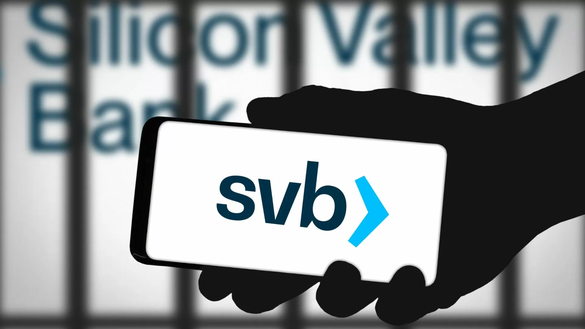 SVB Silicone Valley Bank Logo on Phone with sign in the background. 154 Agency is a full-service agency with a proven track record in media and digital marketing trends