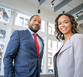 man-and-woman-smiling-inside-building-13