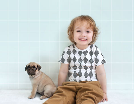 Boy with Pug Puppy_edited.jpg