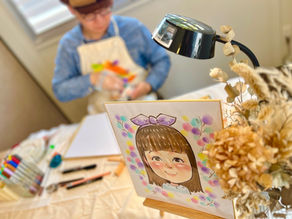 似顔絵イベントで作画する様子