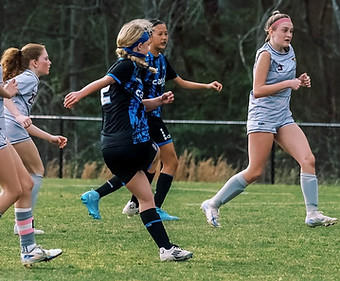 Girls playing soccer
