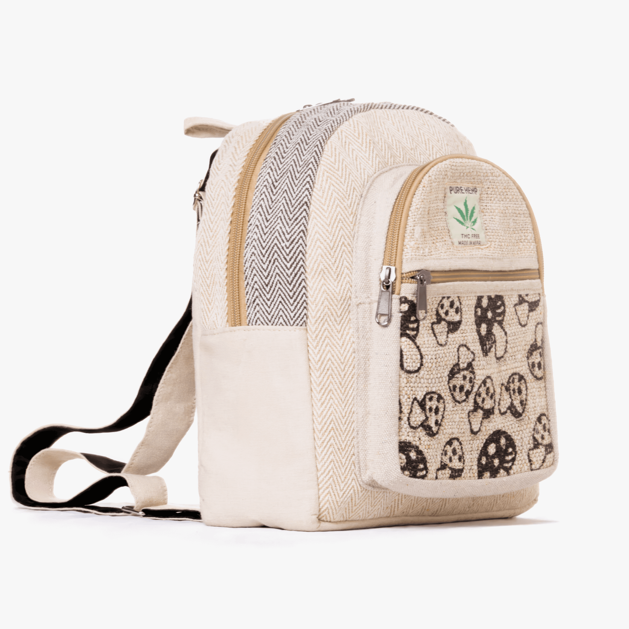Cream backpack with front pocket and mushroom print on white background.