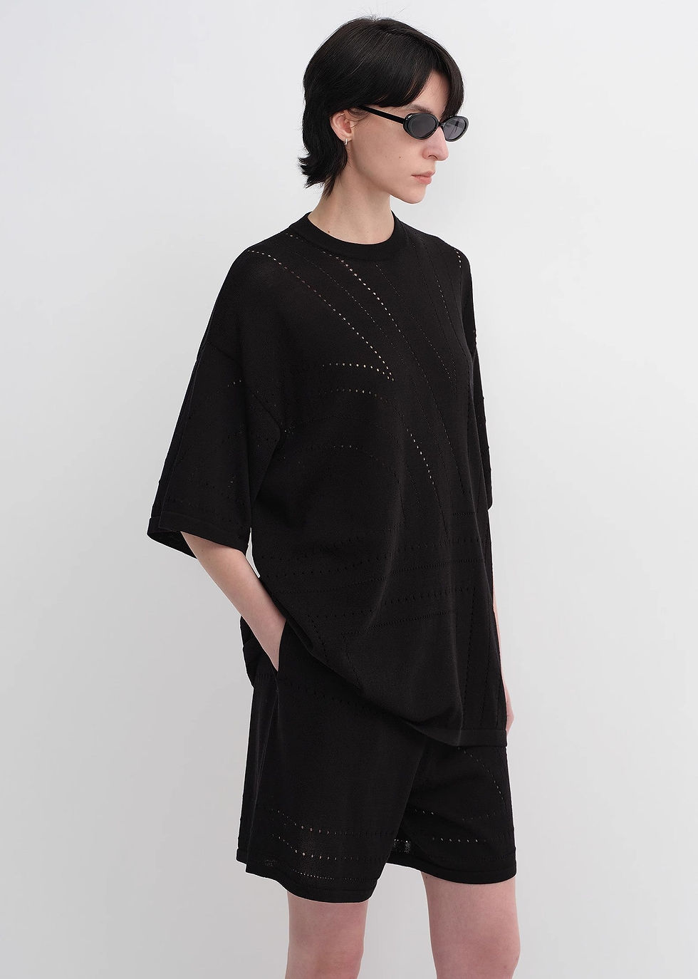 Customized acetate cotton knitted suit with geometric lines.
