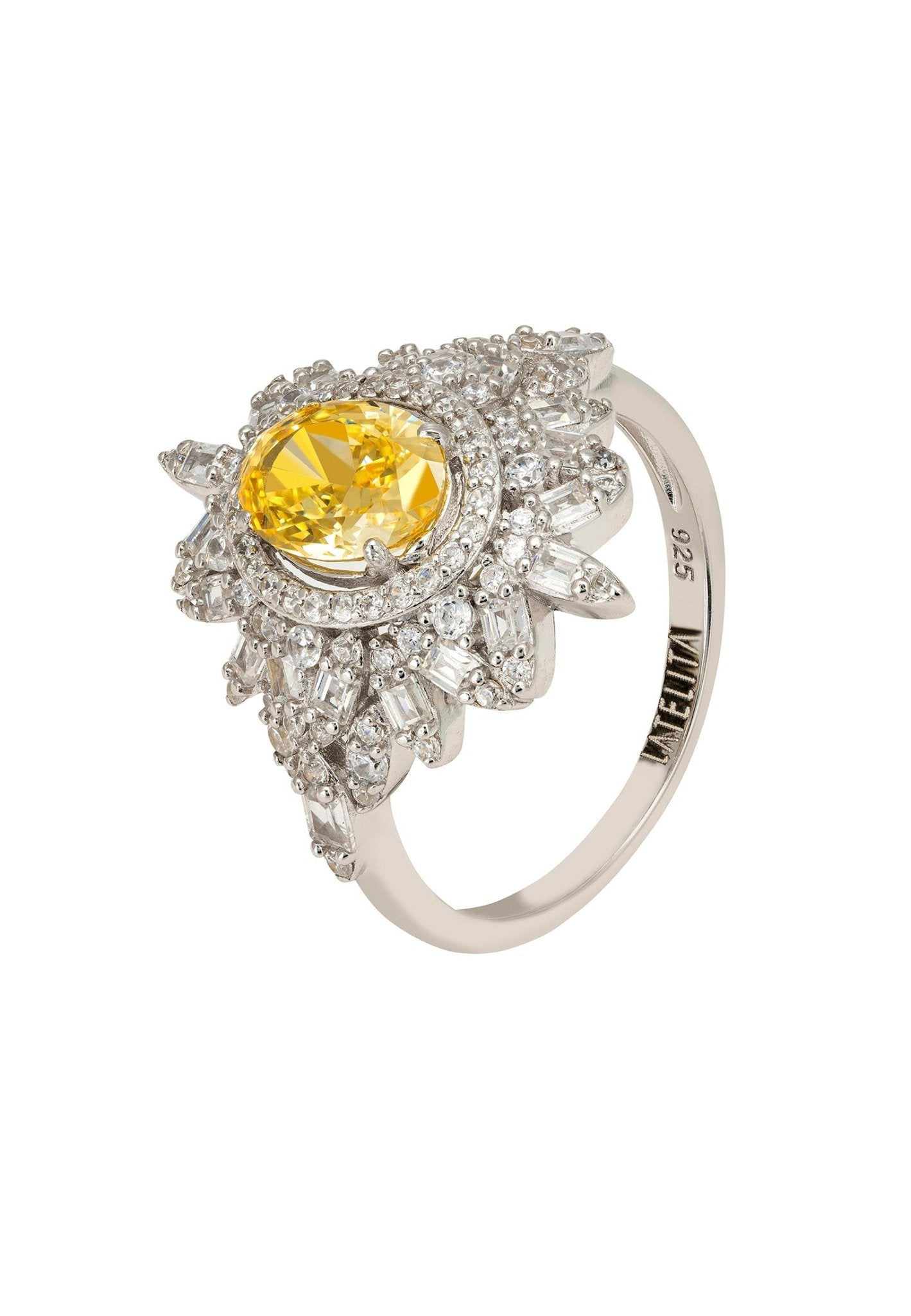 “Arabesque Splendor cocktail ring featuring a yellow topaz gemstone set in elegant silver filigree design.”