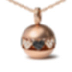Rose gold necklace with heart-shaped diamonds and black onyx accents.