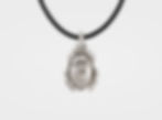 Sterling silver scarab beetle pendant with detailed engraving and polished finish, hanging on a sleek silver chain.