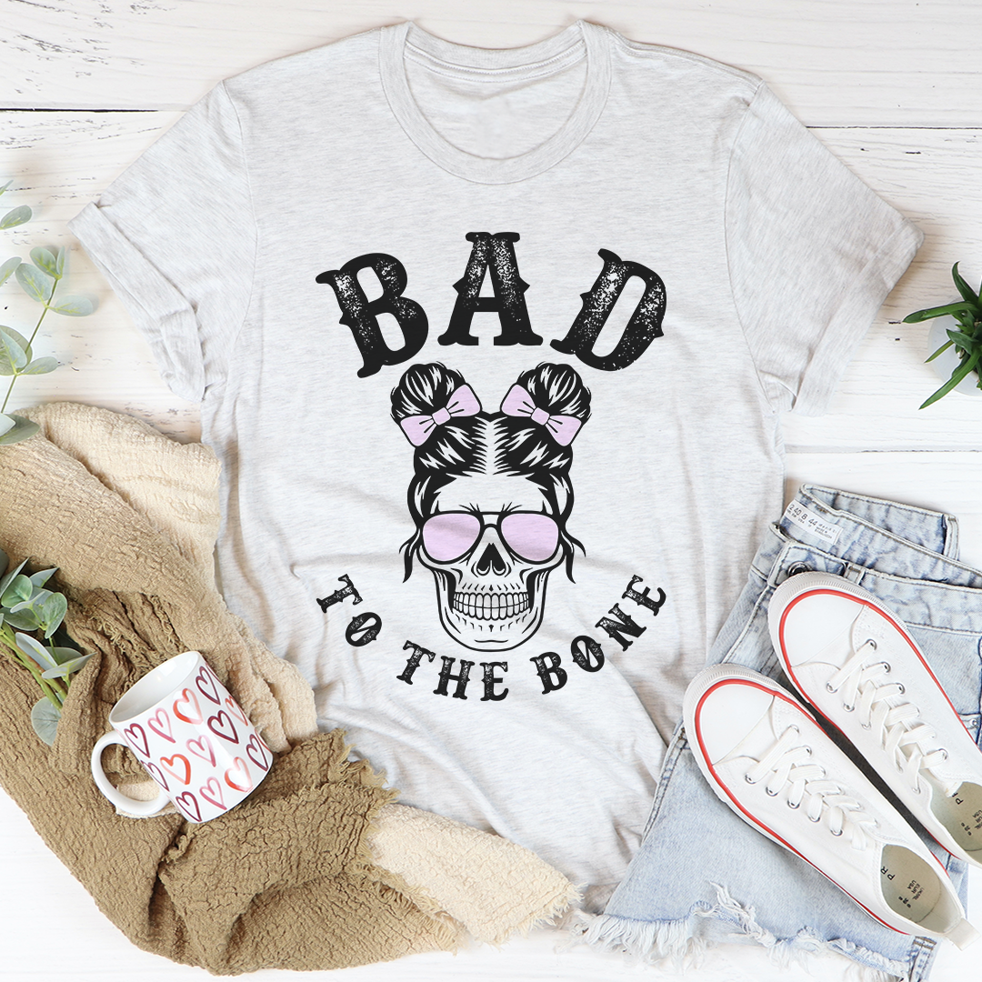 “Bad to the Bone” cute skull T-shirt featuring a playful skull graphic on a soft, casual tee."