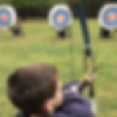 Boy Shooting Arrows