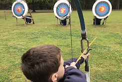 Boy Shooting Arrows