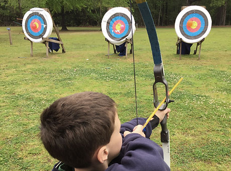 Boy Shooting Arrows