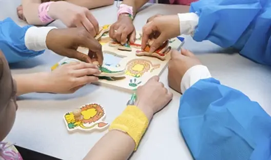 Children Playing in Hospital with Providers