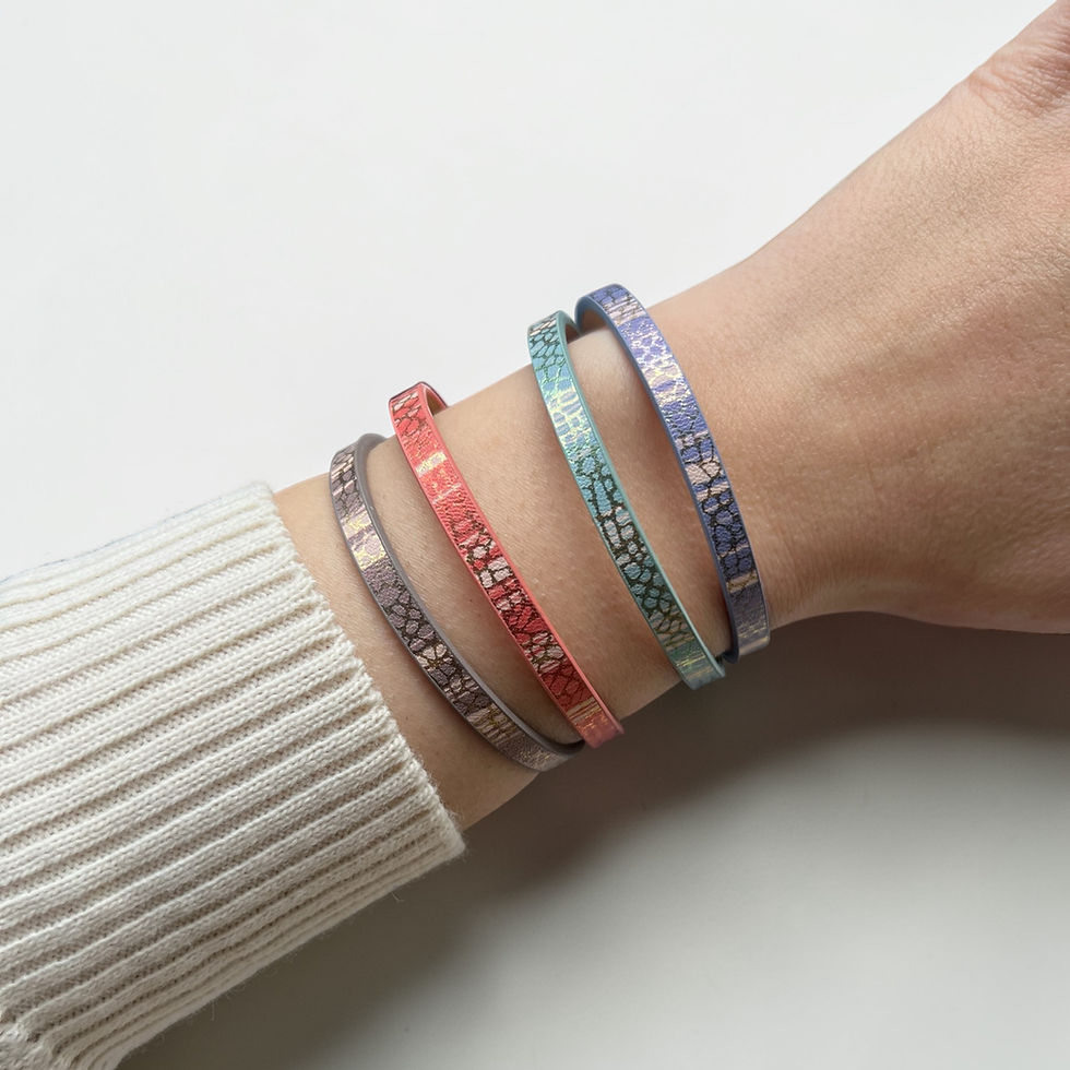 Model wearing vegan leather bracelets