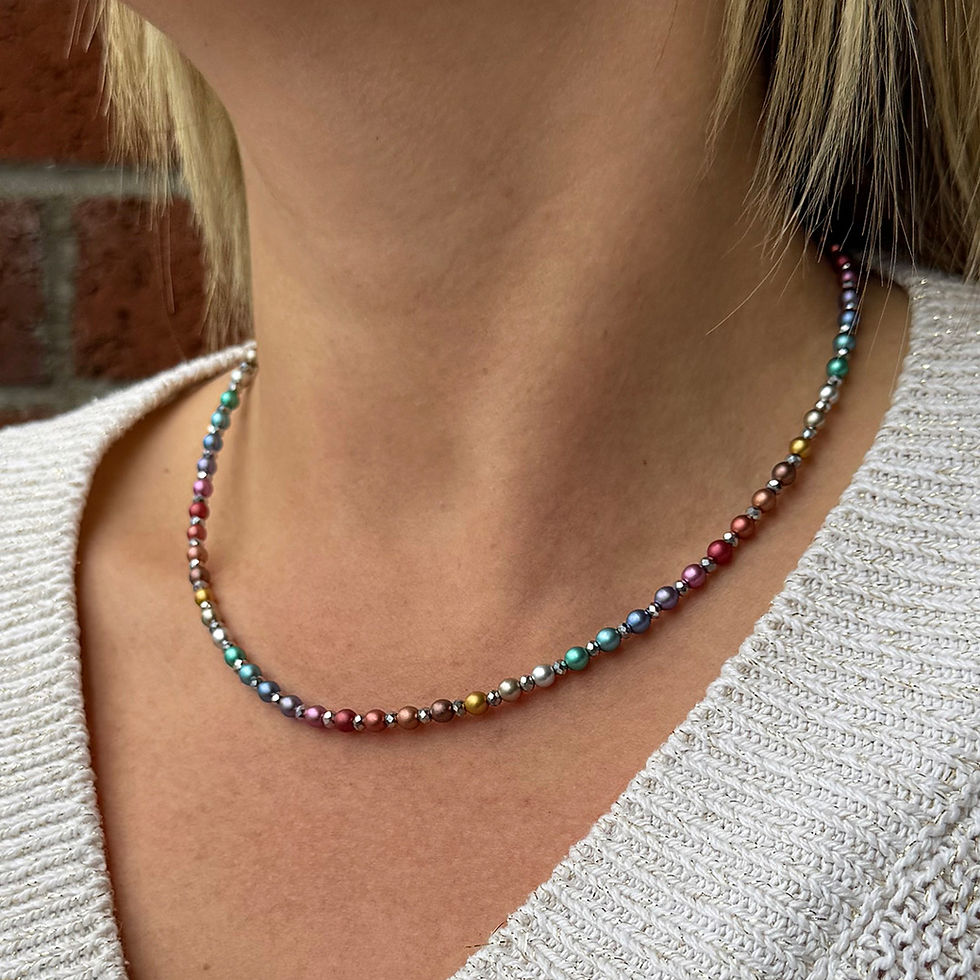 Thumbnail: Model wearing our Rainbow Pearl Sparkle fully beaded necklace