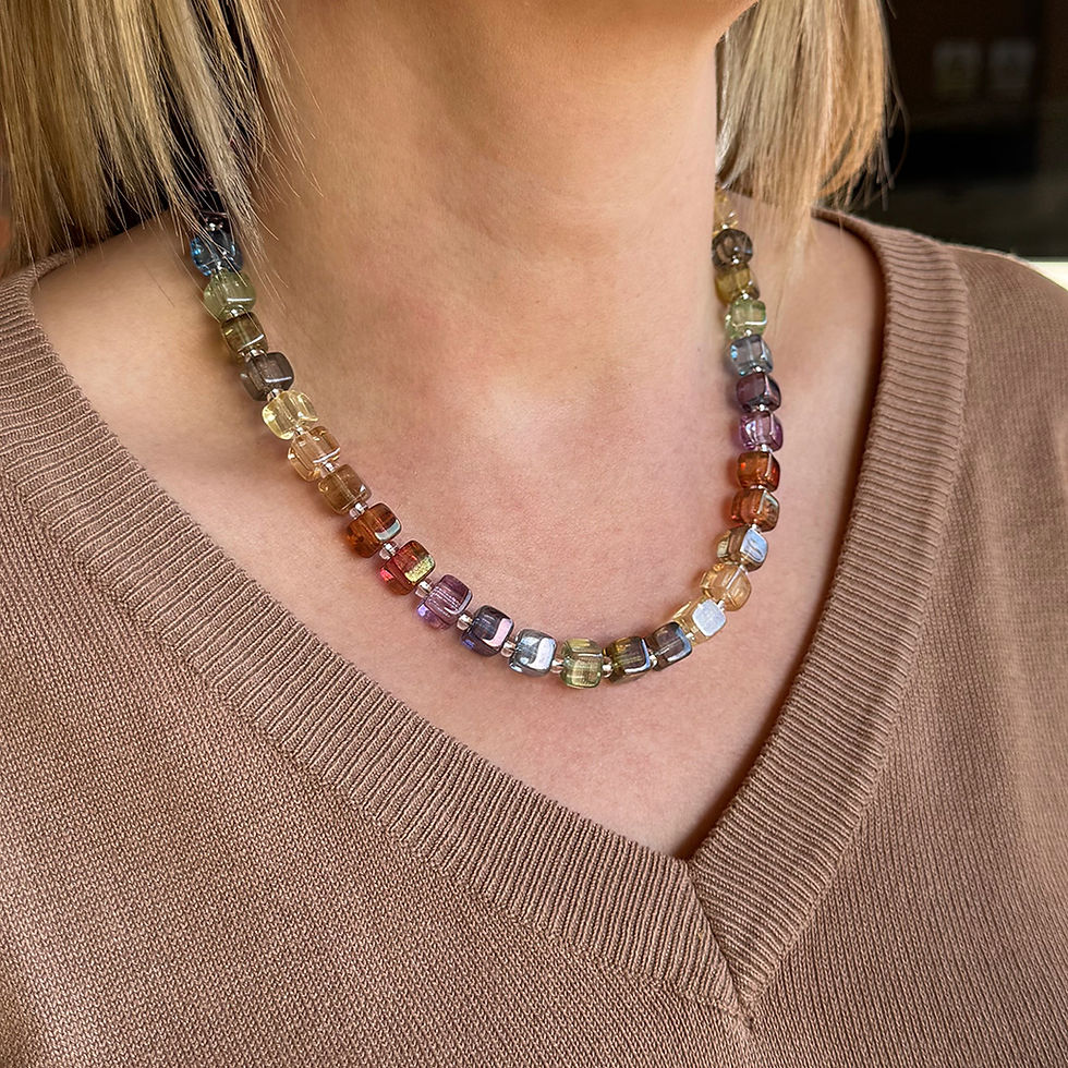 Thumbnail: Model wearing our Symphony fully beaded necklace