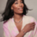 Model wearing the Medley Gemstone bracelet with the matching fully beaded necklace and lepidolite & amethyst earrings