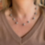 Thumbnail: Model wearing our silver floating pearl necklace