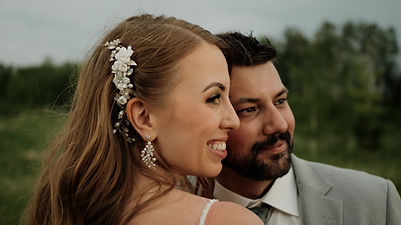 Bride and groom looking off into distance