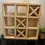 Miniature : Rangement poétique en bois – L’étagère Morpion, entre jeu et artisanat - Fait main