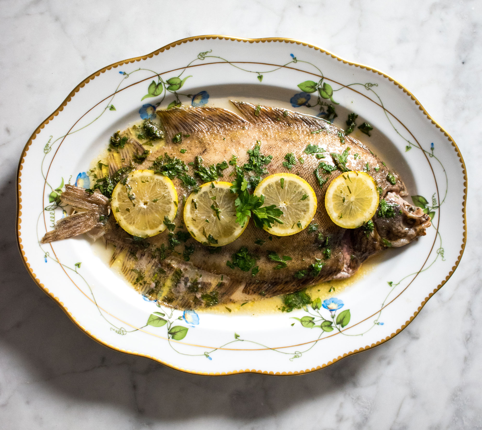 Lemon sole baked with butter, white wine