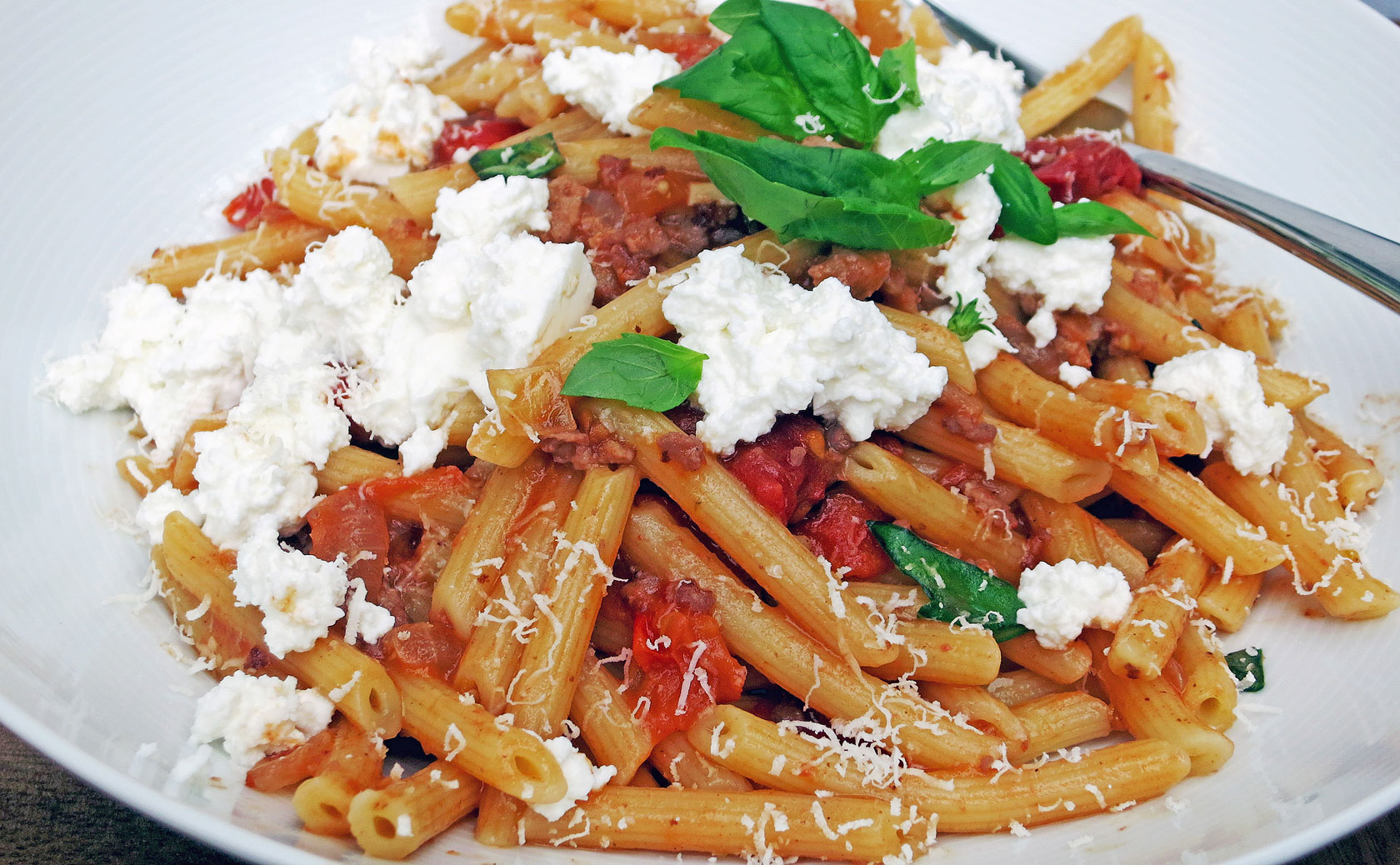 Penne with sausage, fennel, tomatoes & ricotta