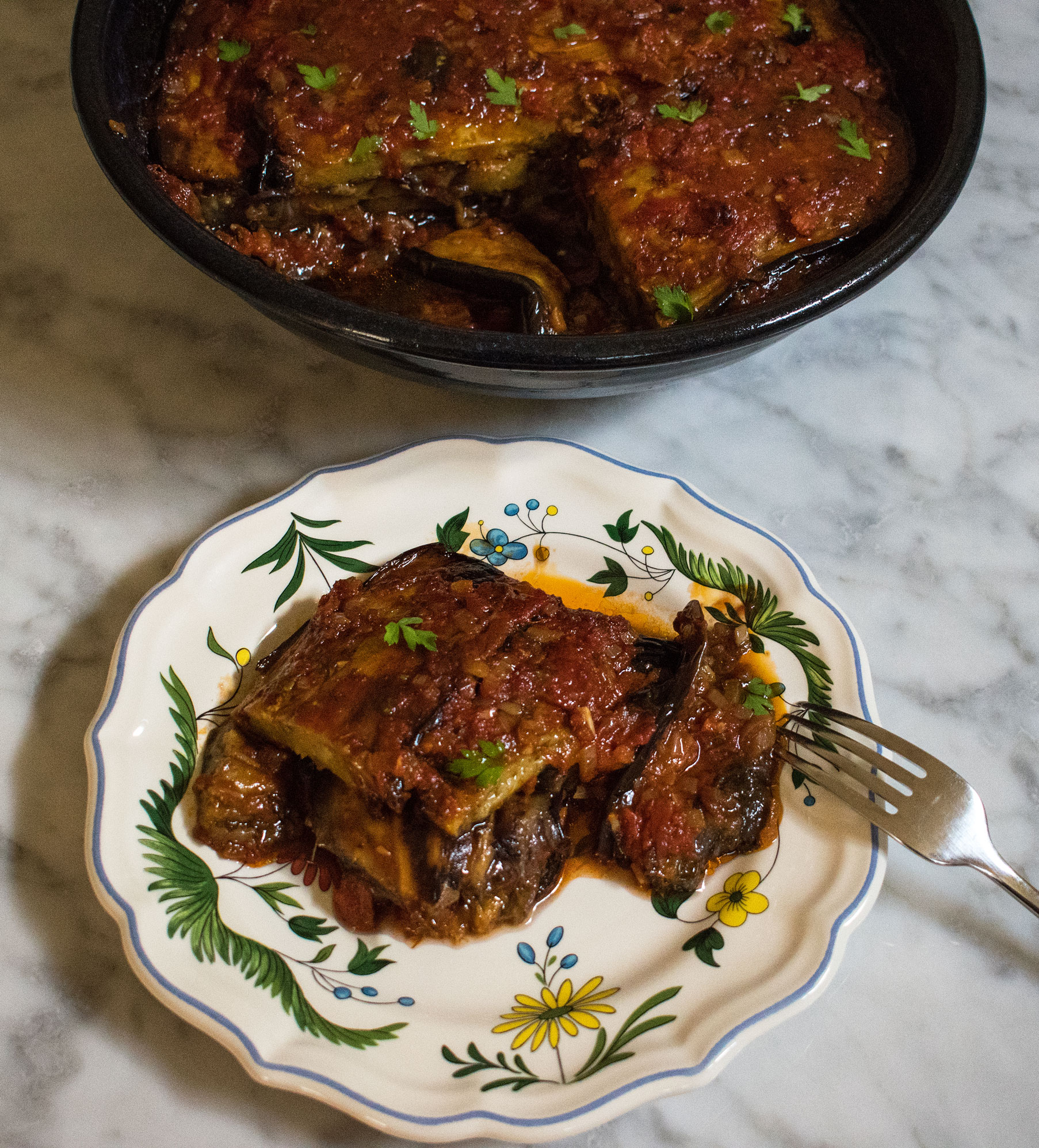 Slow baked aubergines in a rich tomato sauce
