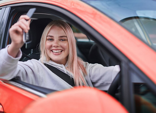 driver smiling in avalon car park
