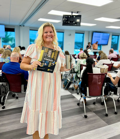 Semonin President Stacy Durbin leading real estate training on industry changes with agents in classroom
