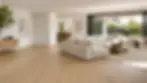 Professional flooring installation services near me in San Diego featuring new light oak flooring in a remodeled living room