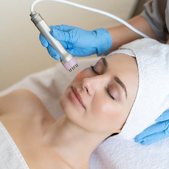 young-woman-lying-cosmetologist-s-table-rejuvenation-procedure-cosmetologist-take-care-abo