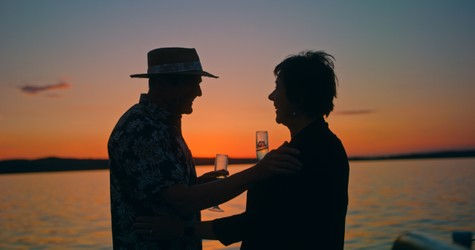 Couple enjoying Champagne and a Sunset in Traverse City Michigan