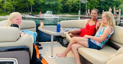 Visitors to Traverse City enjoying a day on a pontoon boat