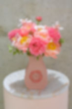 Pink peonies, ranunculus and tulips in pink tapered vase by Lena's Floral Designs, handmade in Toronto.