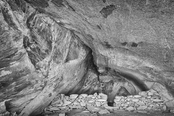 B&W photo of Ballroom Cave, Butler Wash, Bears Ears National Monument.