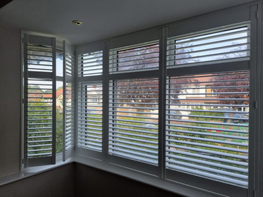 L shaped shutter bay window