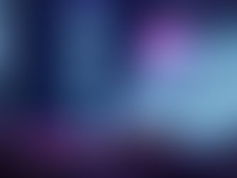 Hands typing on a laptop with a website displayed. Glowing icons hover beside the screen, creating a tech-focused ambiance in dim lighting.