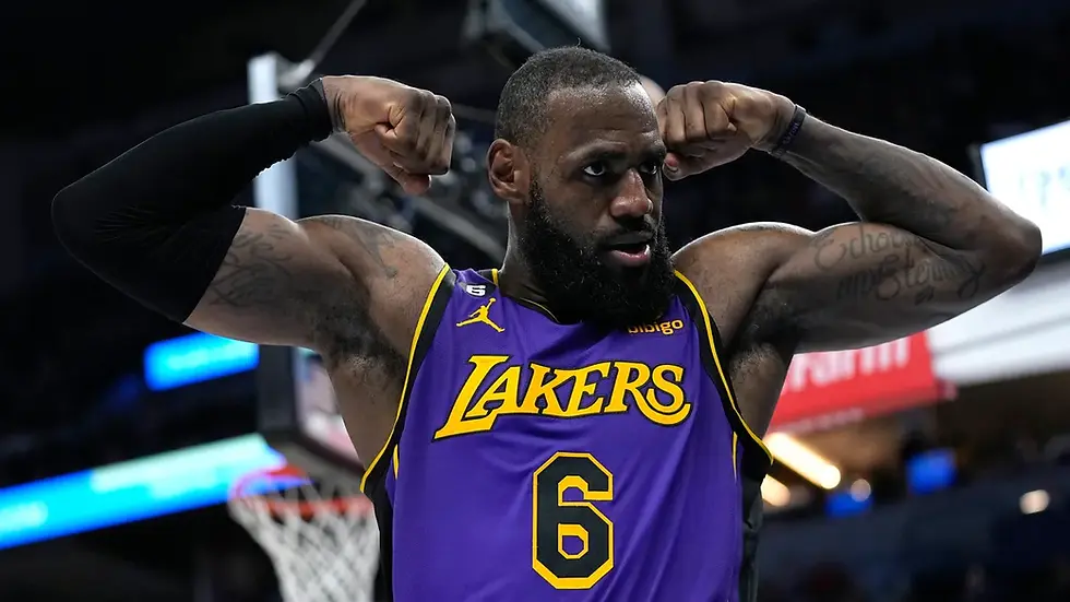 Lebron James flexing after winning a game
