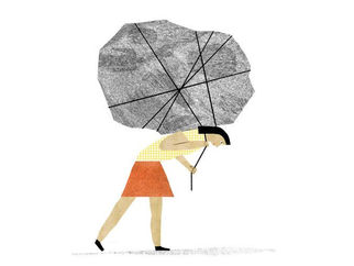 a woman carrying a heavy burden